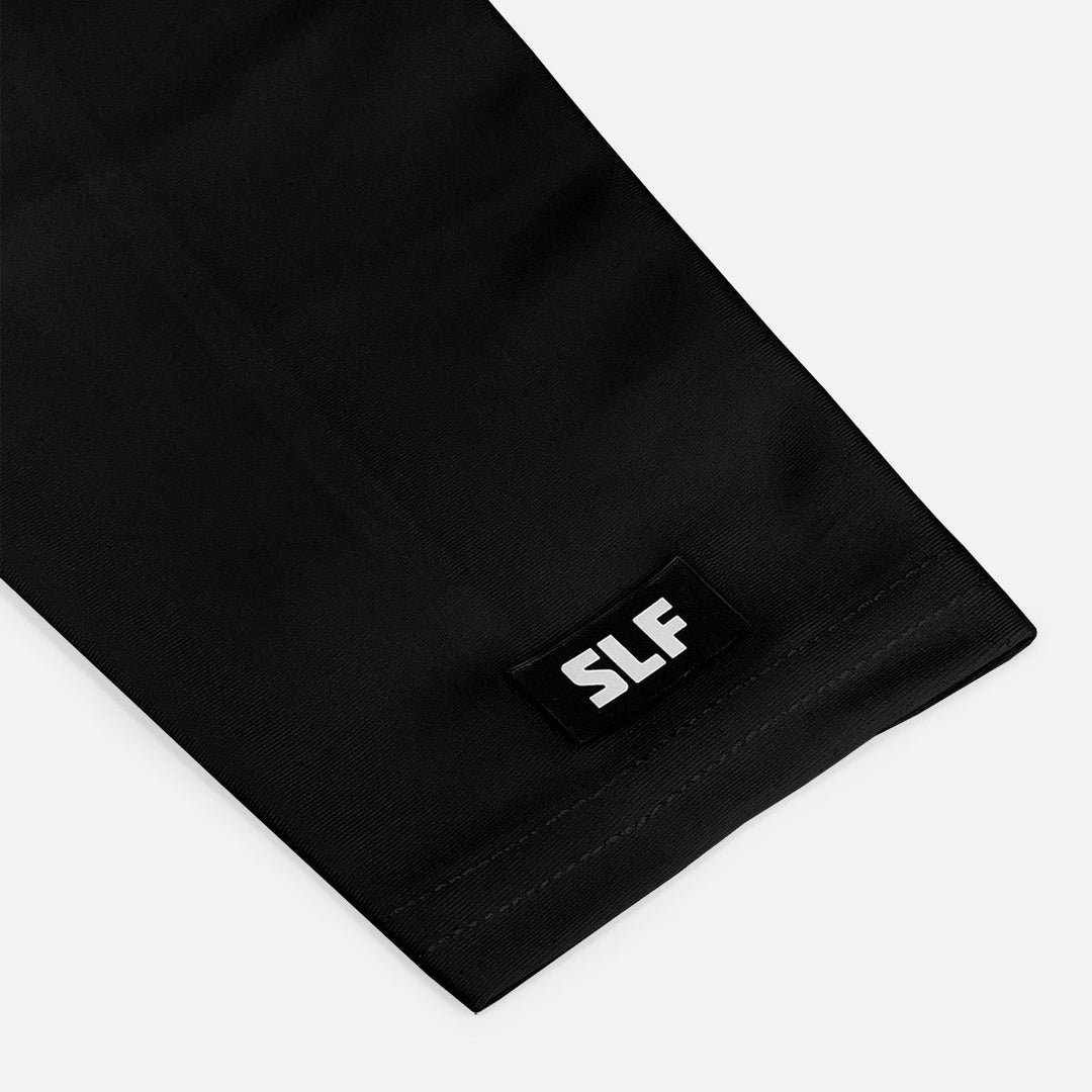Black fabric with a 'SLF' label on a white background