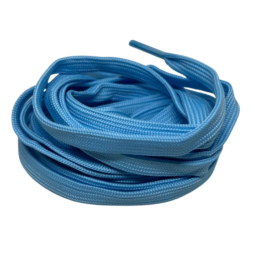 Coiled blue shoelaces on a white background.