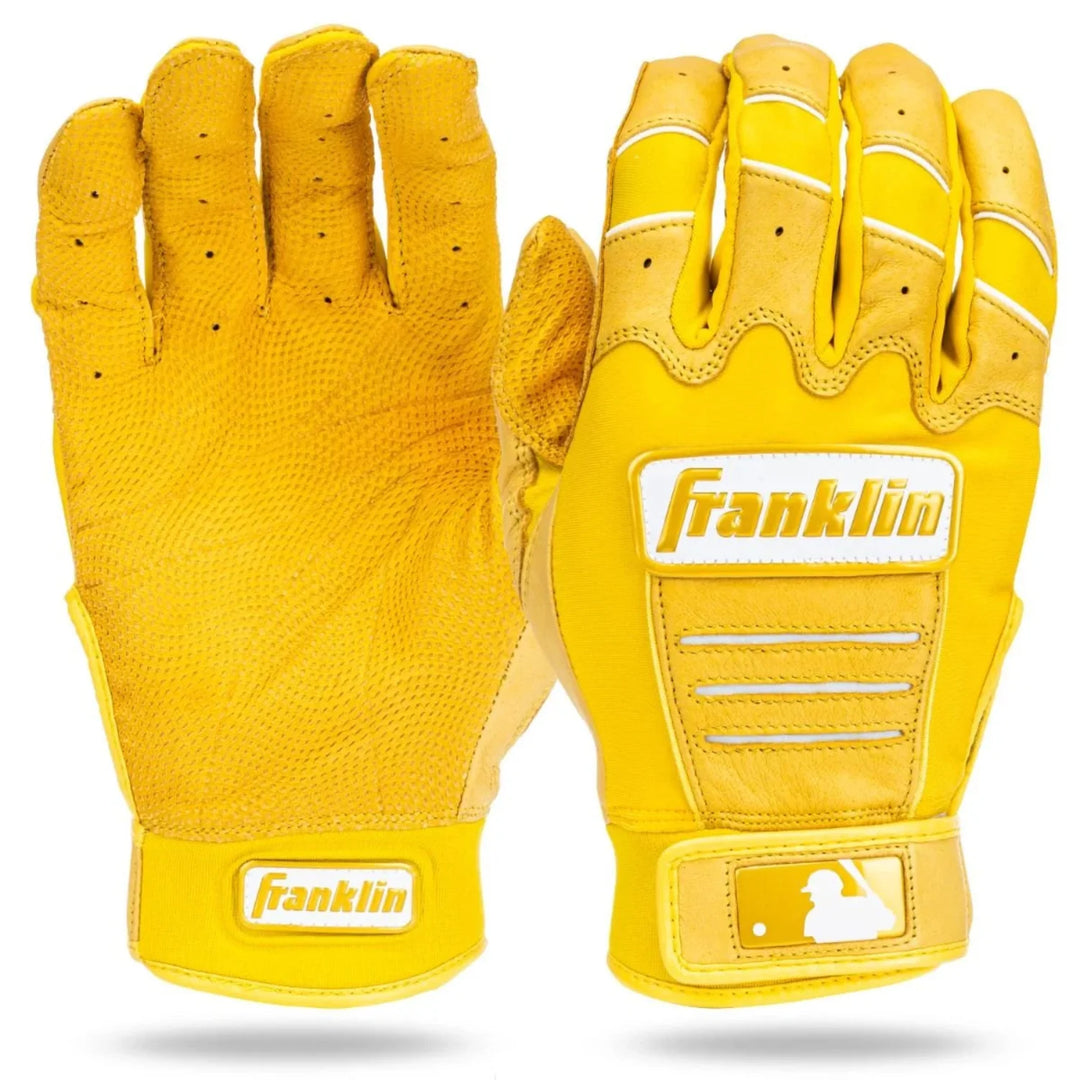 Yellow baseball gloves with Franklin logo on a white background