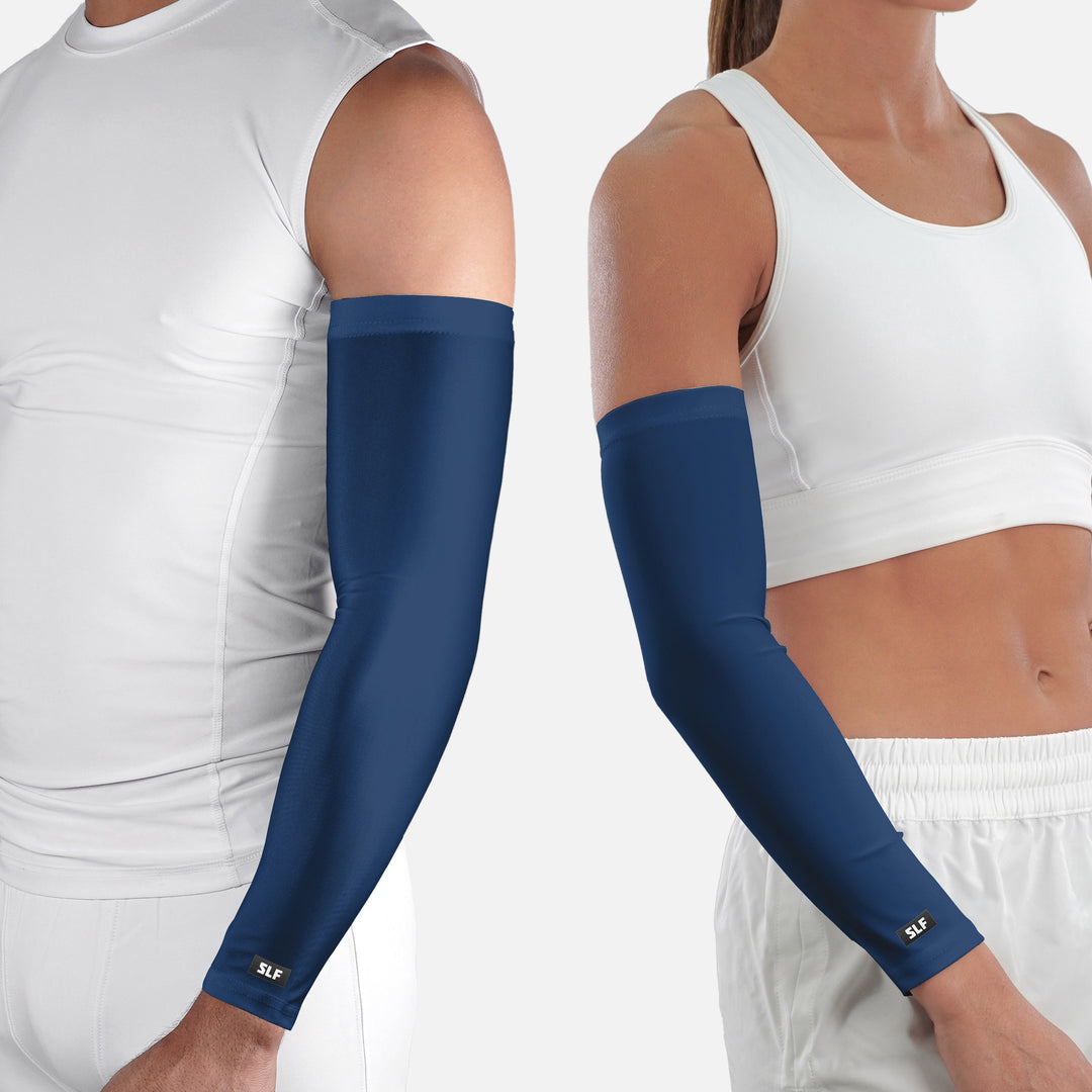 Two people wearing navy blue arm sleeves on a white background