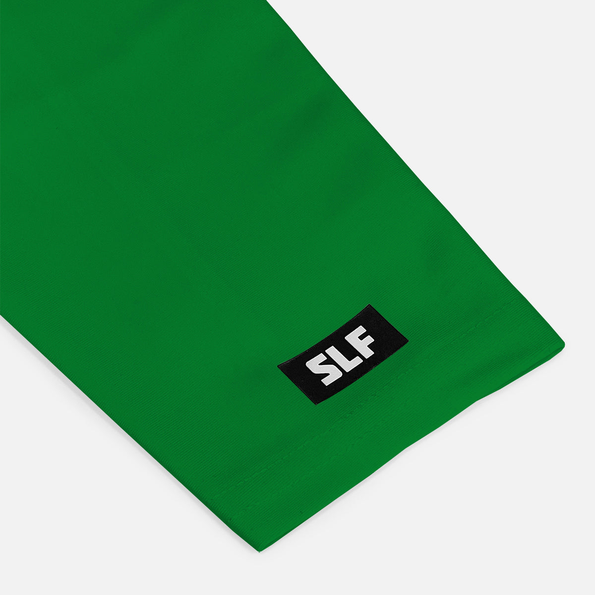Green fabric with a 'SLF' logo on a white background