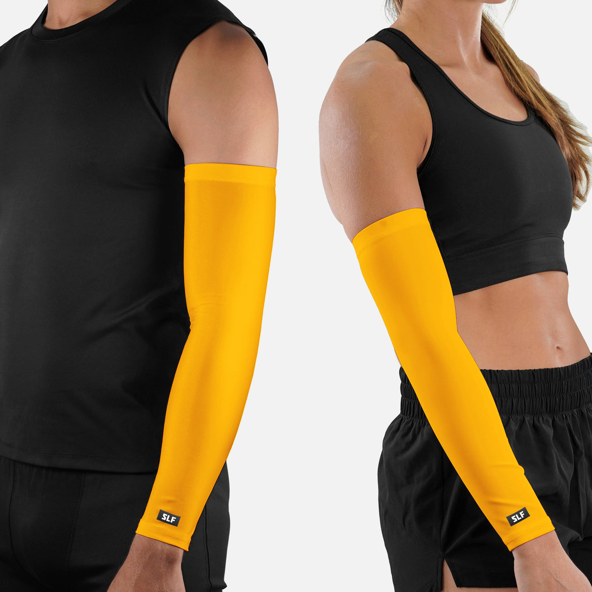 Two people wearing black athletic wear with yellow arm sleeves on a white background