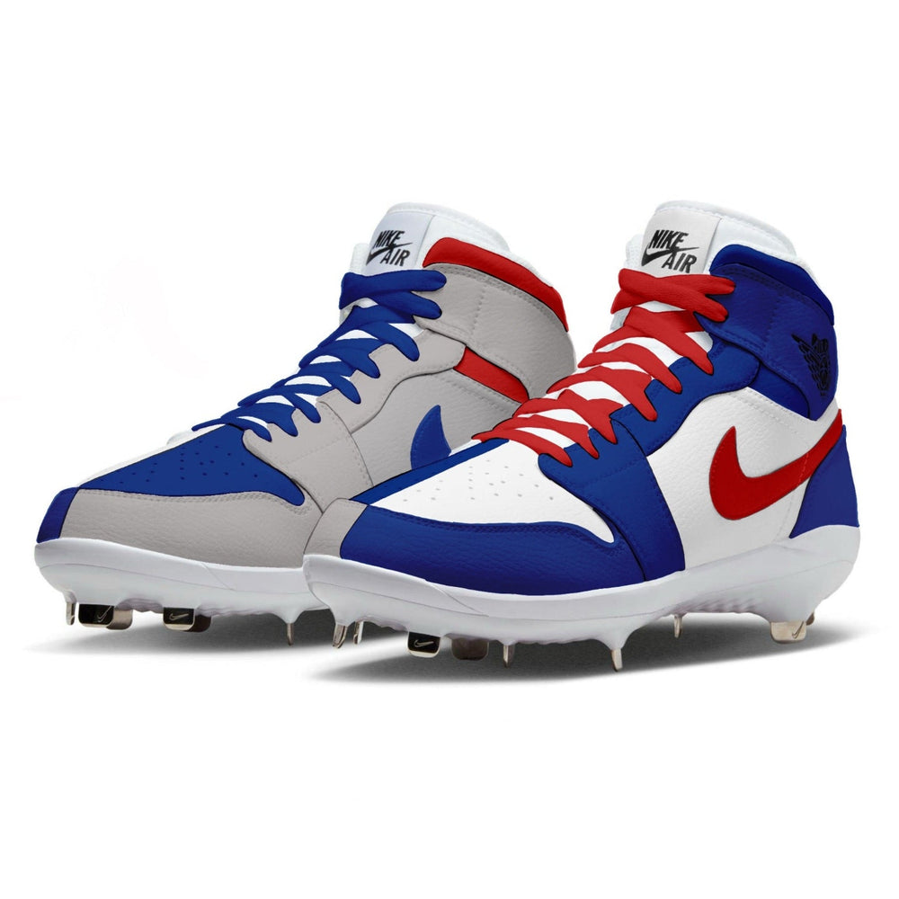 Pair of Nike Air baseball cleats with blue, red, and gray design on a white background