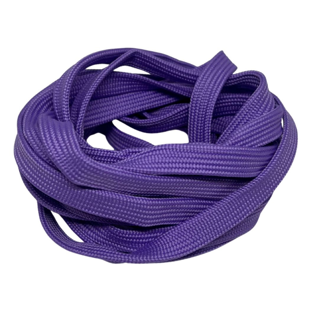 Coiled purple shoelace on a white background.