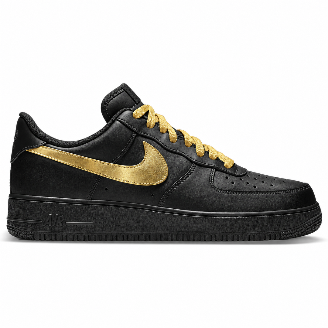 A Nike Air Force 1 Low sneaker in black with a metallic gold Swoosh and gold laces, shown in a side profile on a white background.