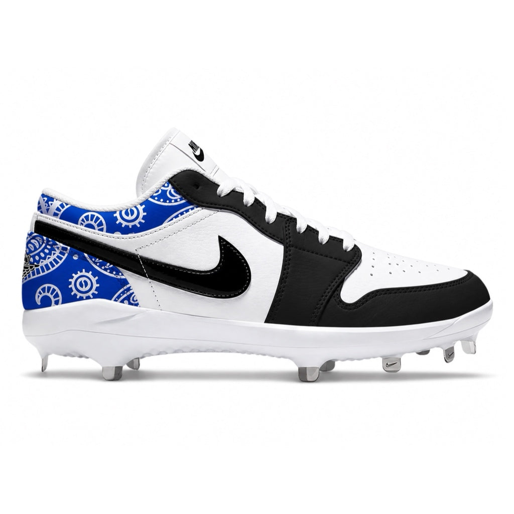 Black and white cleats with blue paisley 
pattern on a white background