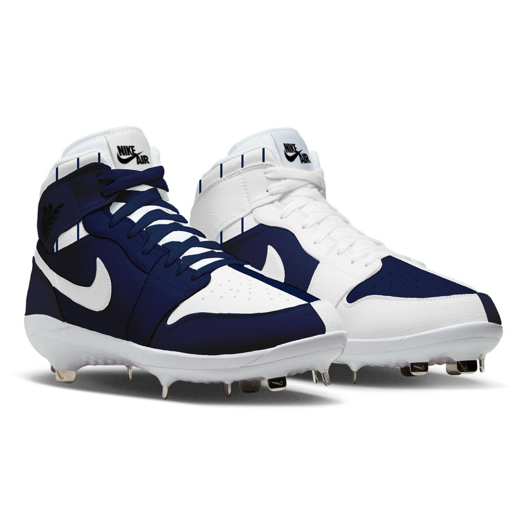 Pair of blue and white Nike cleats on a white background