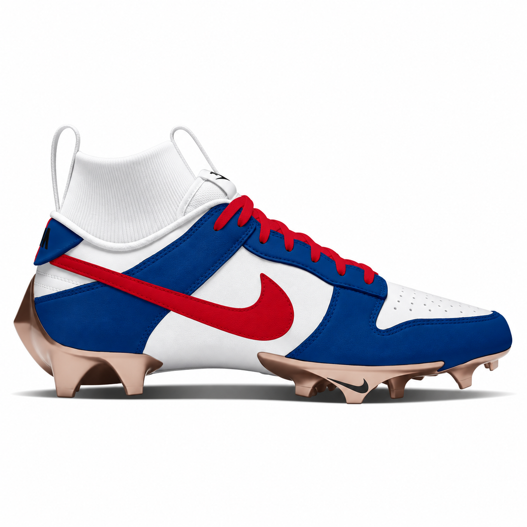 A Nike football cleat in a patriotic red, white, and blue colorway, featuring a white sock-like collar, white and blue panels, a red Nike Swoosh, and tan cleats on a white background.