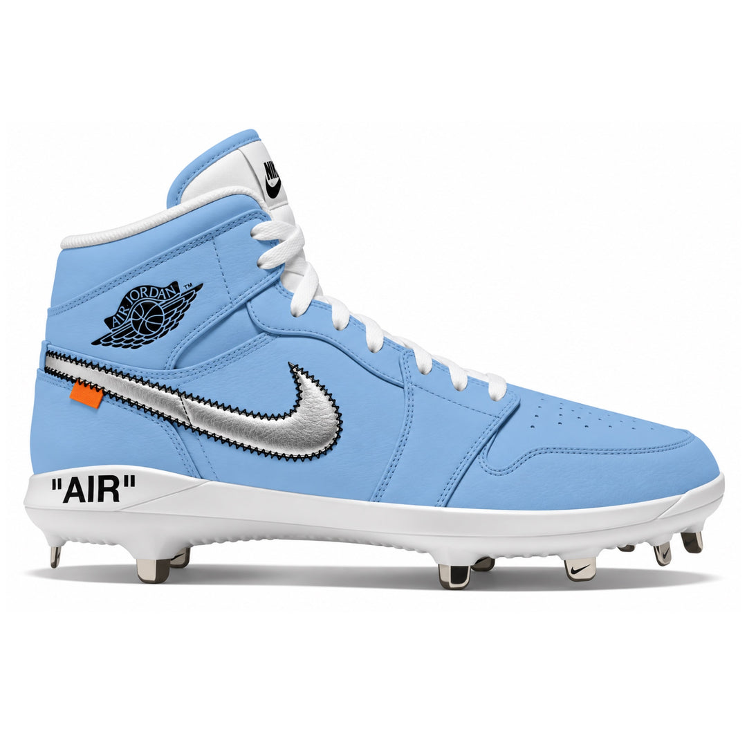 A light blue high-top baseball cleat featuring a metallic silver Nike Swoosh, a black Jordan Wings logo, 'AIR' text on the midsole, and white laces and collar lining, shown against a plain white background.