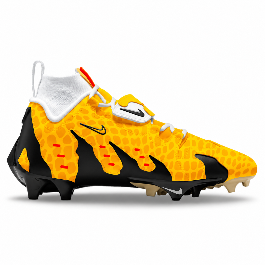 A Nike football cleat in a vibrant yellow and black colorway, featuring a textured pattern, white collar, and white laces on a clean white background.