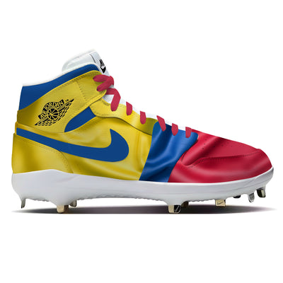 Colombia waving flag design on Jordan 1 Retro baseball cleats featuring bold yellow, blue, and red colors.