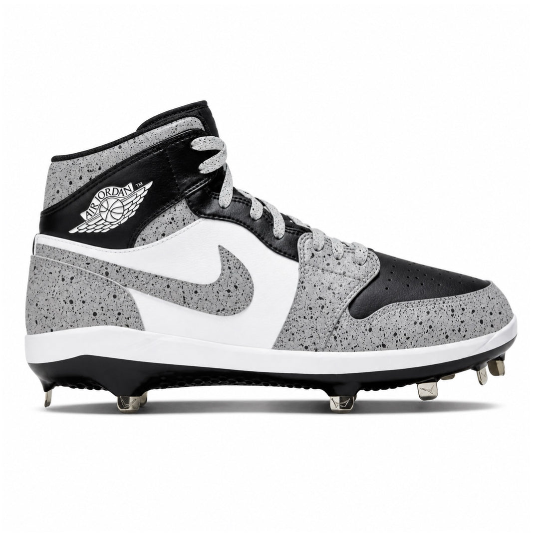 Black and gray cleated shoe with Nike logo on a white background