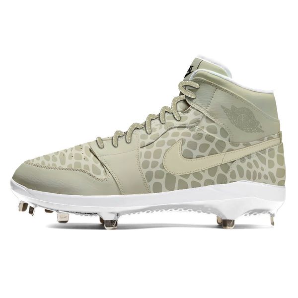 Jordan 1 Retro baseball cleats with a desert viper snake pattern design in cream and light sand with a stealth finish