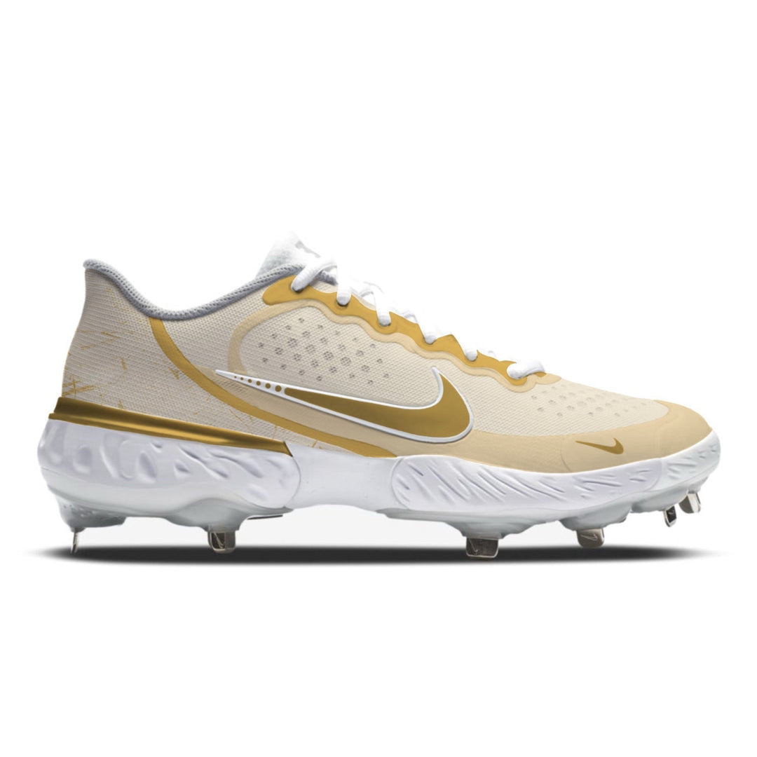 White and gold cleated shoe on a white background