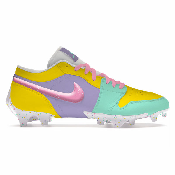 Custom-painted Egg Hunt Jordan 1 vapor low td football cleats in pastel yellow, lavender, mint, and pink with confetti-speckled soles by Stadium Custom Kicks
