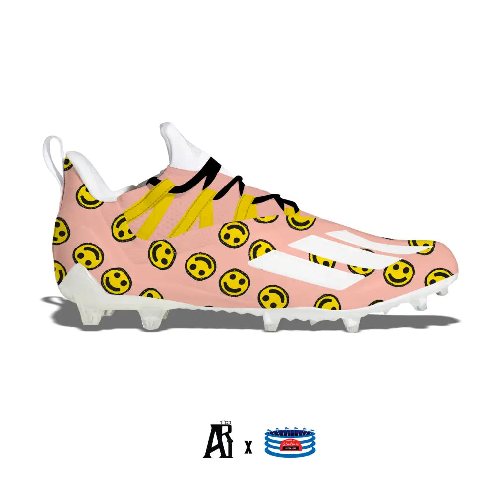 Pink smiley-face football cleat from Feelin Good Adidas Adizero 11.0 collection