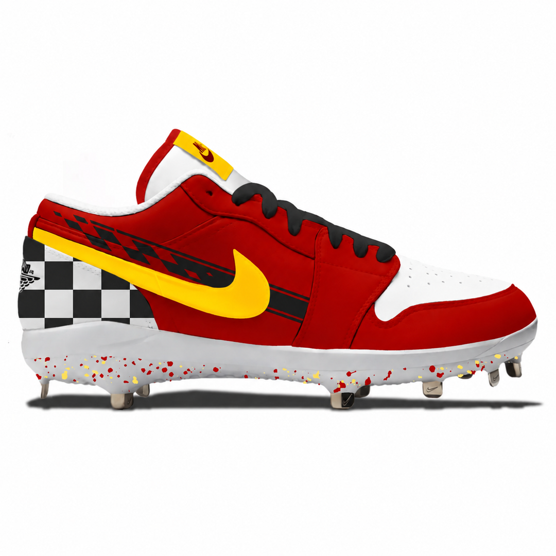A red, white, and yellow Jordan baseball cleat with black laces, a black-and-white checkered heel, and red, yellow, and black speckled detailing on the sole, shown on a white background.