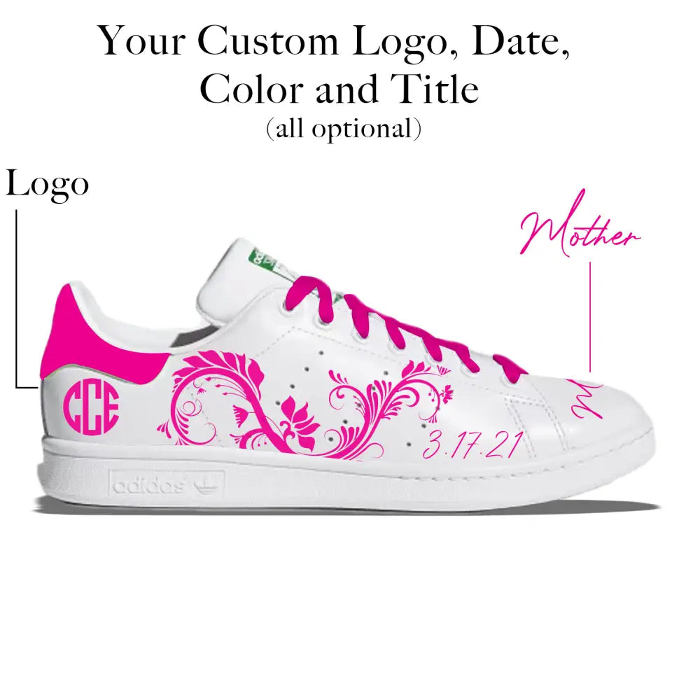 White sneaker with pink designs and text on a white background