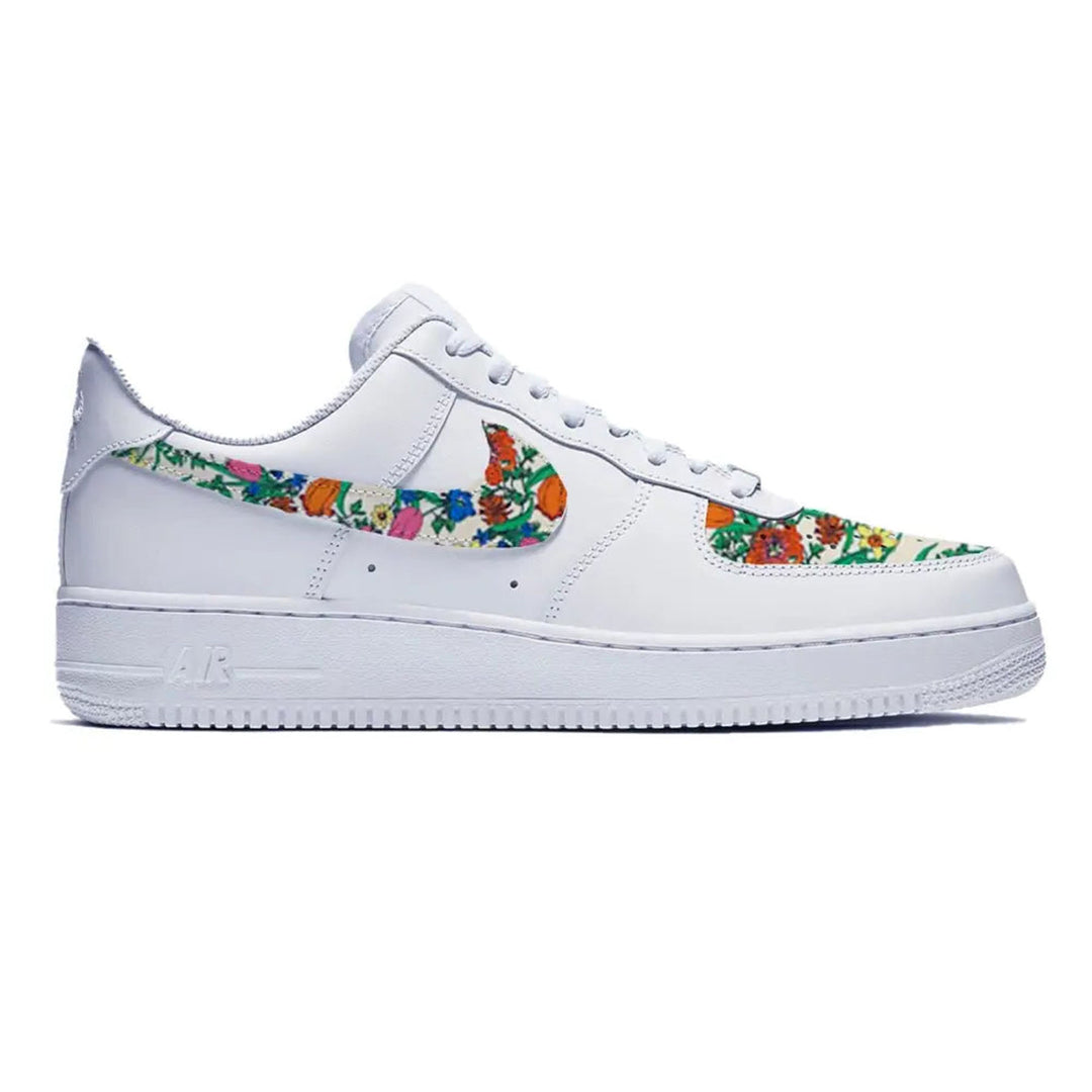 White Nike Air Force 1 Low sneaker with floral accents for the Floral Nike Air Force 1 shoe collection