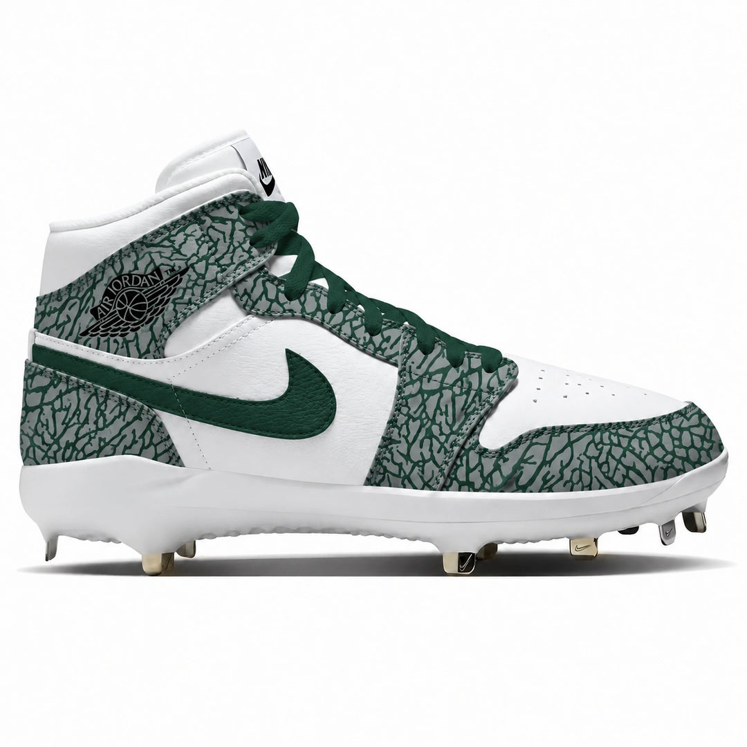 A high-top baseball cleat featuring a white leather base with dark green suede overlays, a green Swoosh, and a green and white elephant print pattern on the toe and heel panels. The shoe is shown in a side profile view against a plain white background.