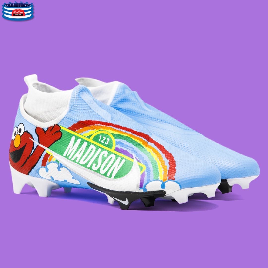 Customized light blue Soccer Cleats displayed in the Full Custom product showcase