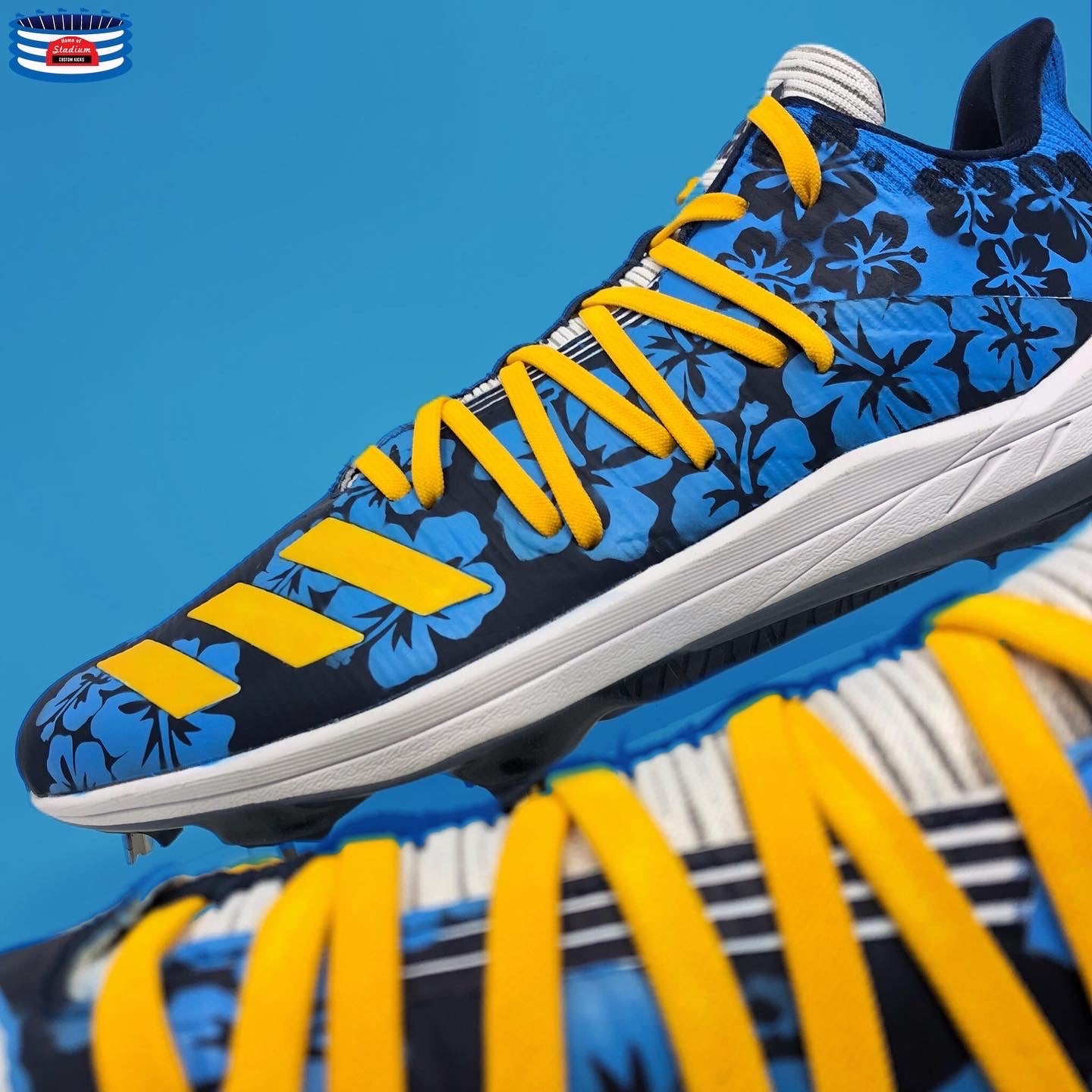 Blue floral Adidas baseball cleats displayed on the full custom product page