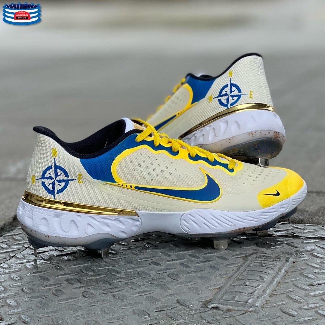Full Custom baseball cleats featuring a unique compass design for personalized style