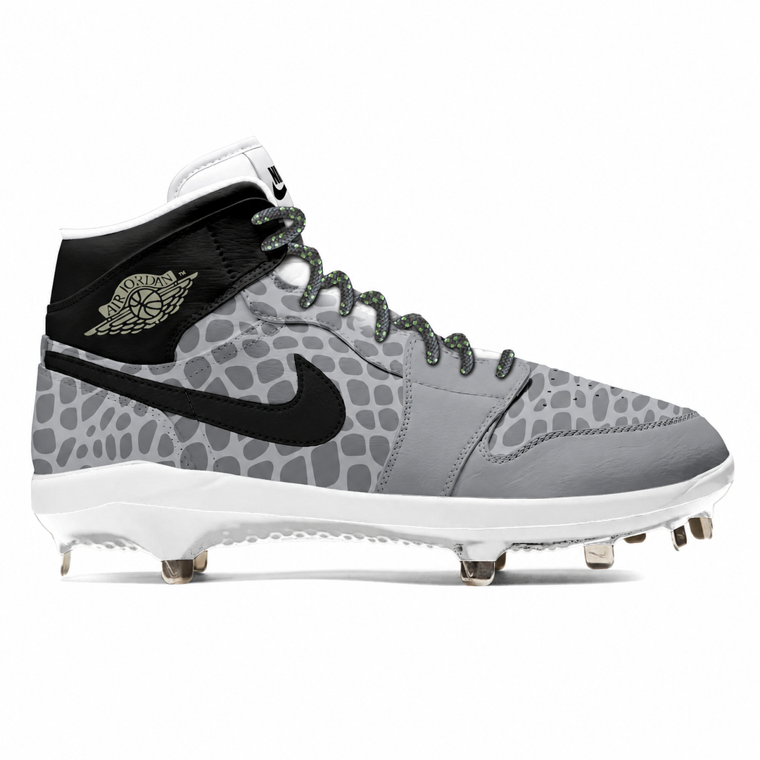 A Nike high-top baseball cleat in gray and black with a leopard print pattern, featuring a black Swoosh, black ankle collar, and white midsole with metal studs.