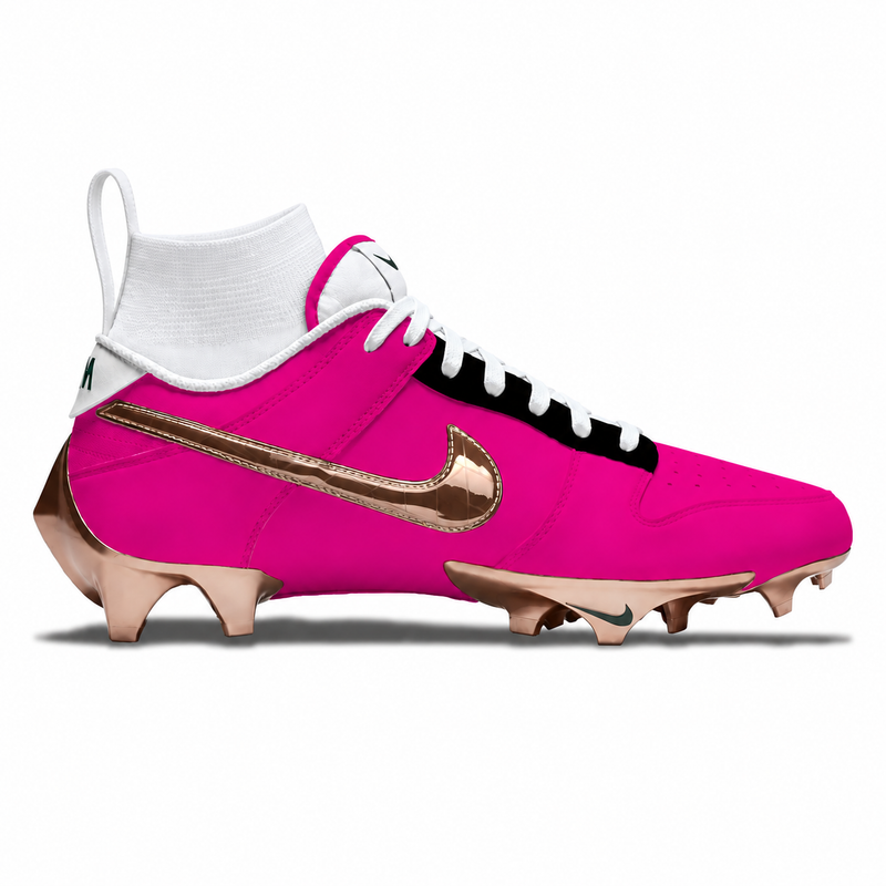 A Nike football cleat in vibrant hot pink with metallic rose gold studs and a metallic gold Swoosh, featuring a white ankle sock and white laces on a white background.