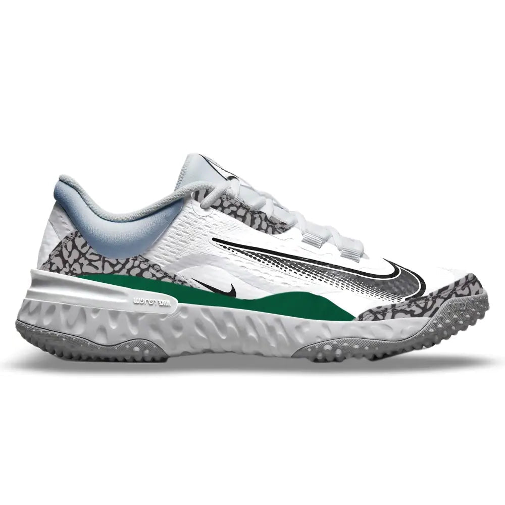 White baseball turf shoe with green sole on a white background