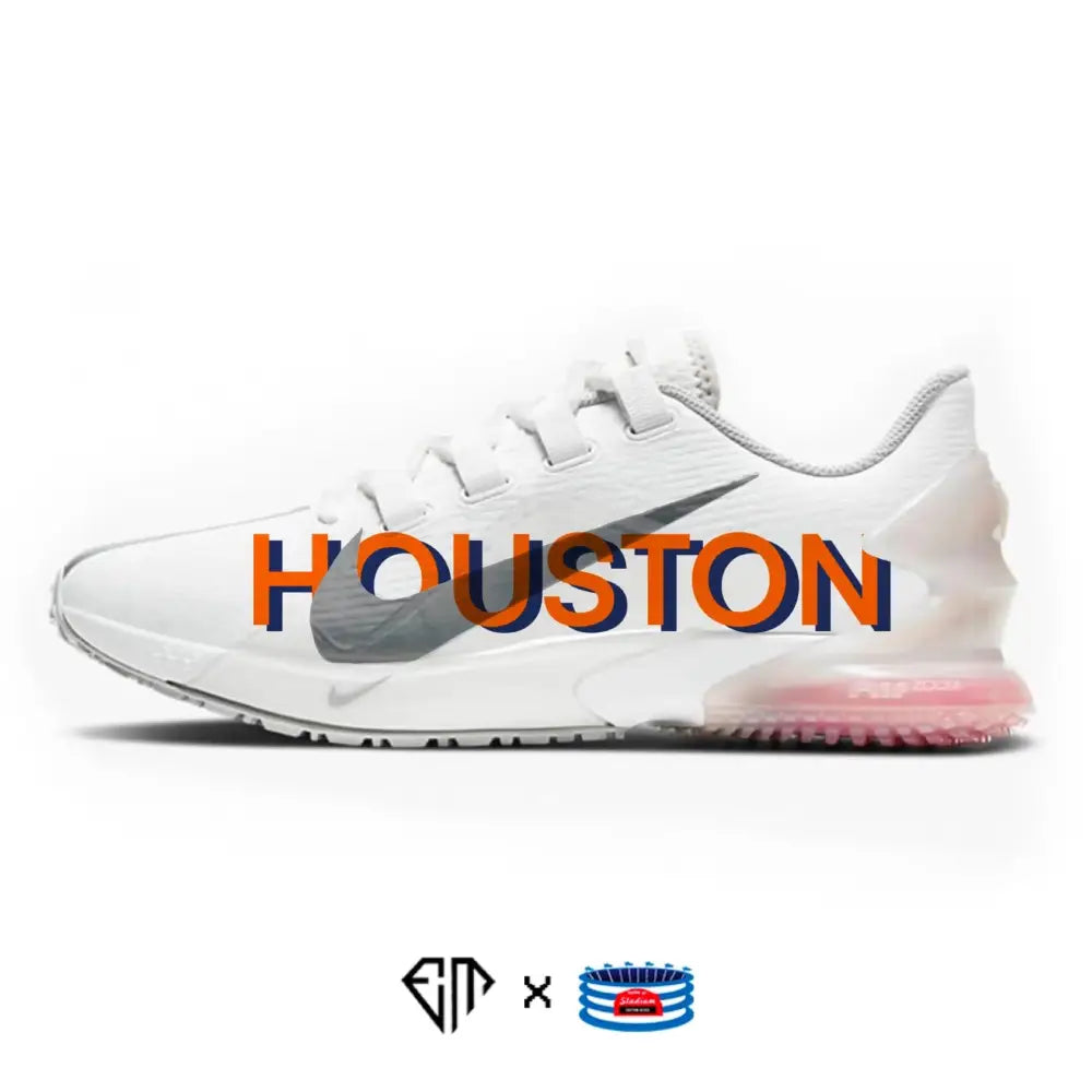 White Nike running shoe with Houston text from Houston Nike Force Zoom Trout 7 Turf