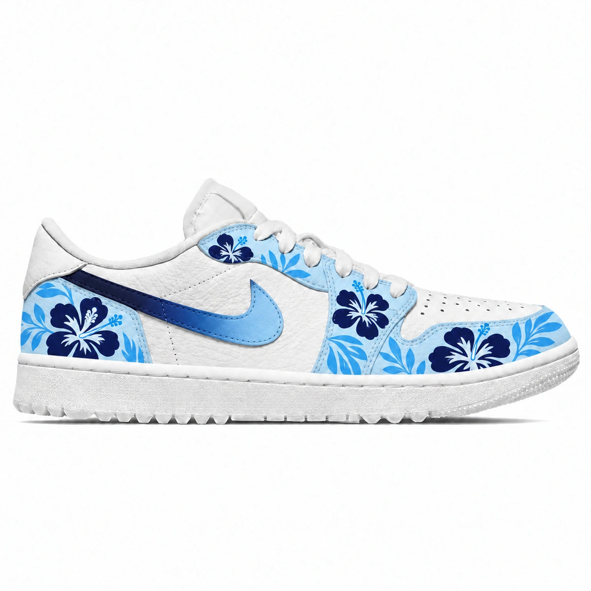 A white low-top golf sneaker featuring a light blue and navy blue hibiscus flower pattern on the sides and toe, with a metallic light blue Swoosh on a white background.