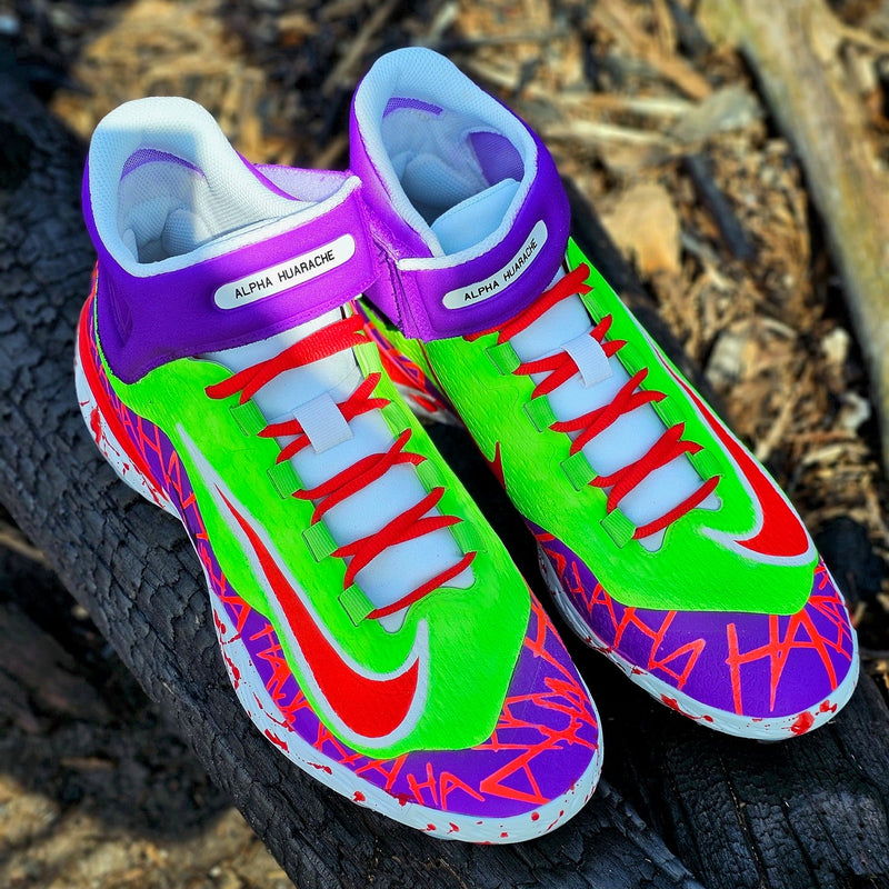 Colorful baseball cleats with a vibrant design on a natural background