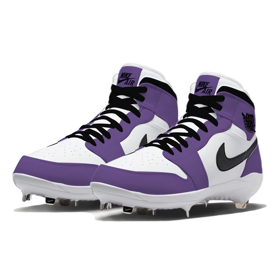 Angled view of custom Jordan 1 Retro Court Purple mid-top baseball cleats with metal spikes, hand-painted in purple, white, and black.