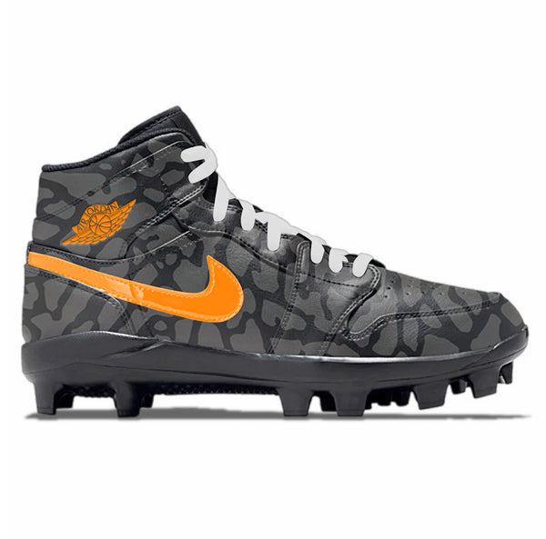 Jordan 1 MCS Mid baseball cleats in Blaze Ops design featuring black elephant print upper with orange Nike swoosh and matching Wings logo by stadium custom kicks.
