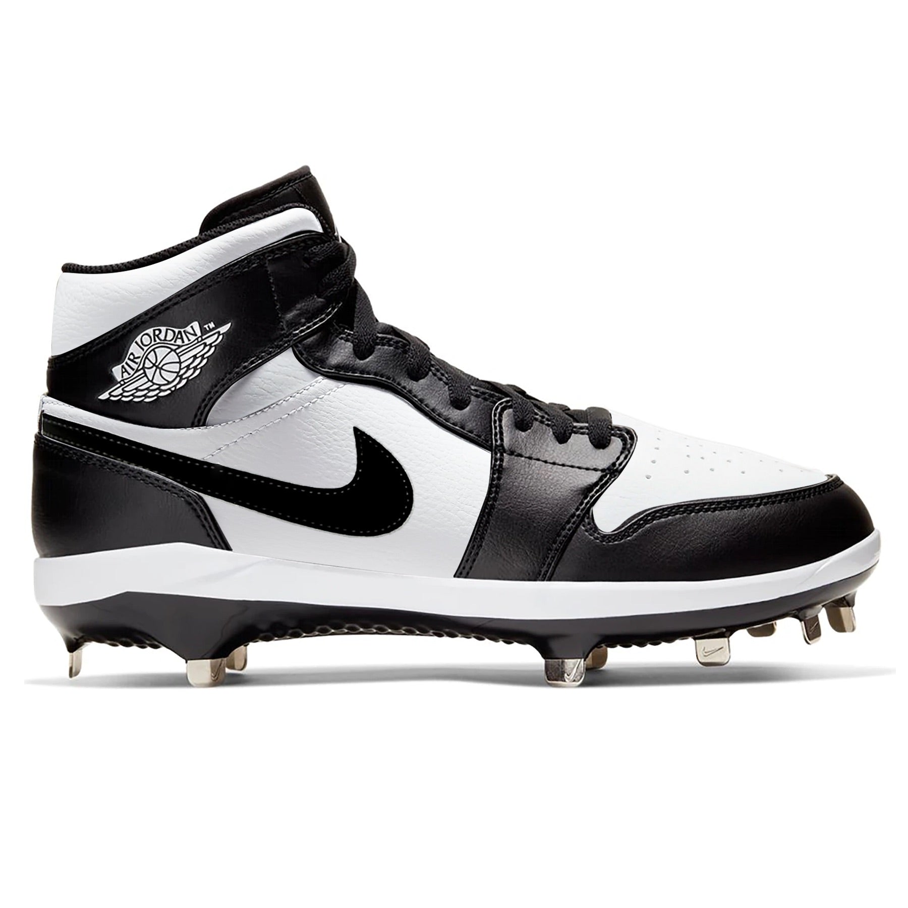 Side view of custom Jordan 1 Retro Panda mid-top baseball cleats with metal spikes, hand-painted in black and white.