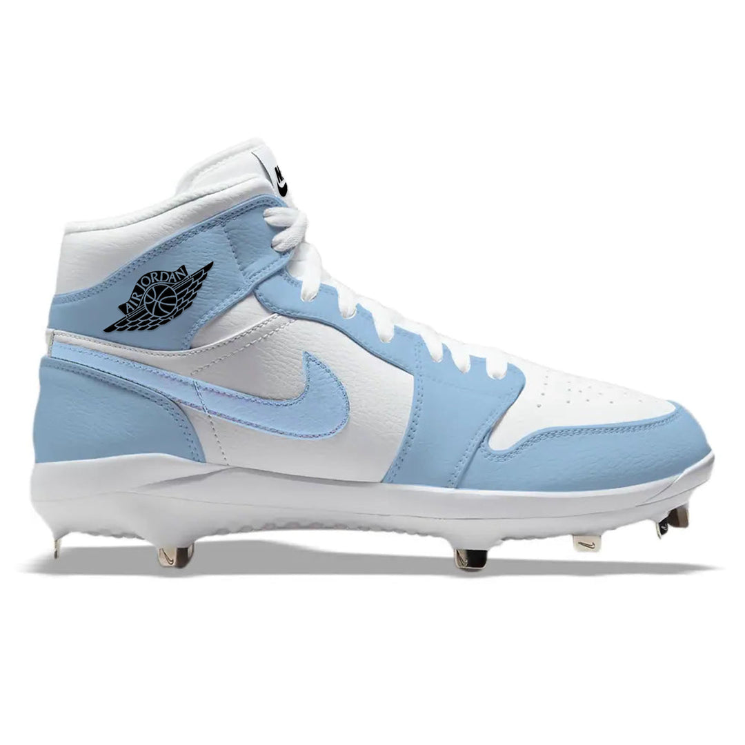 Hand-painted Jordan 1 UNC custom mid-top baseball cleats with metal spikes shown in a detailed side profile view in Carolina blue and white.