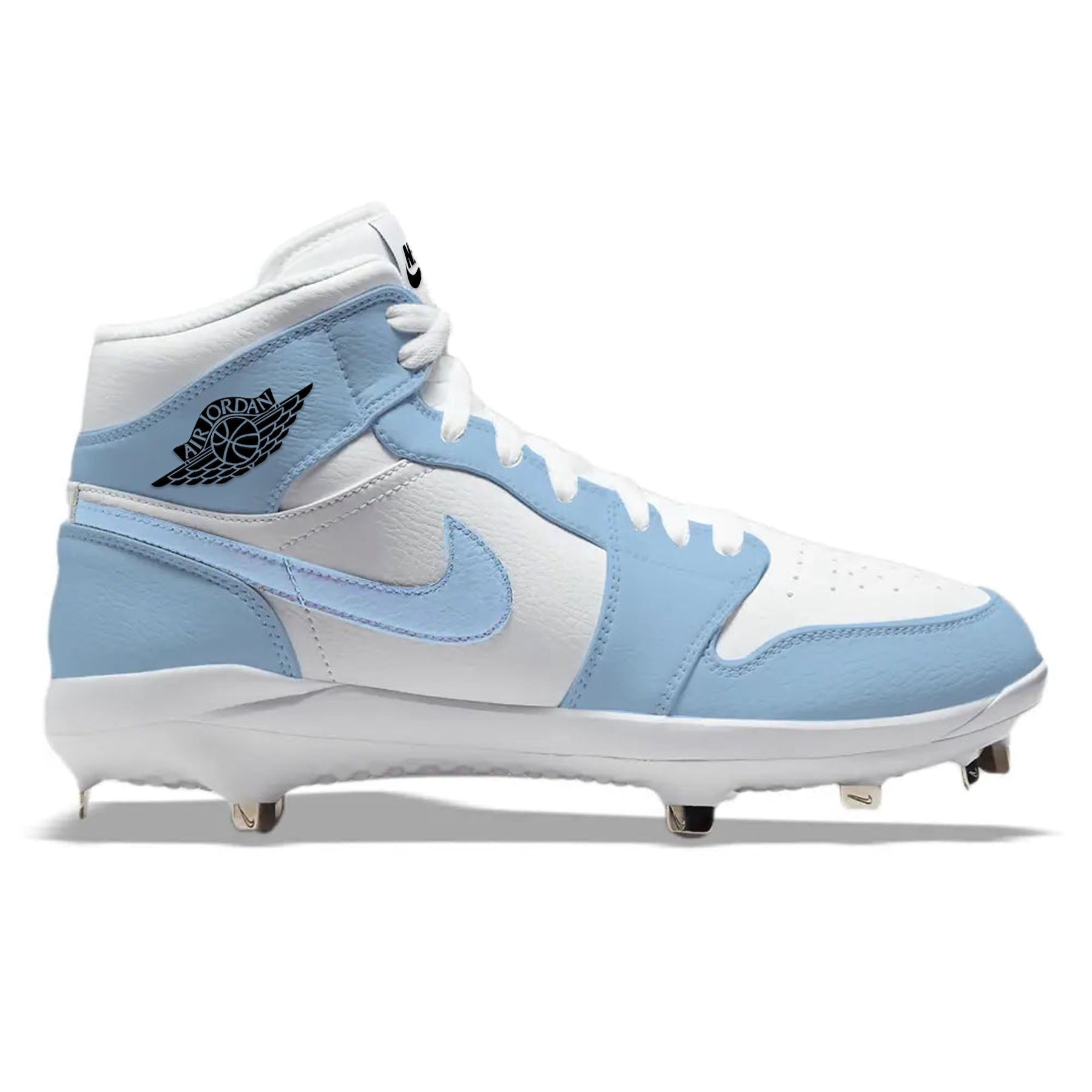 Hand-painted Jordan 1 UNC custom mid-top baseball cleats with metal spikes shown in a detailed side profile view in Carolina blue and white.