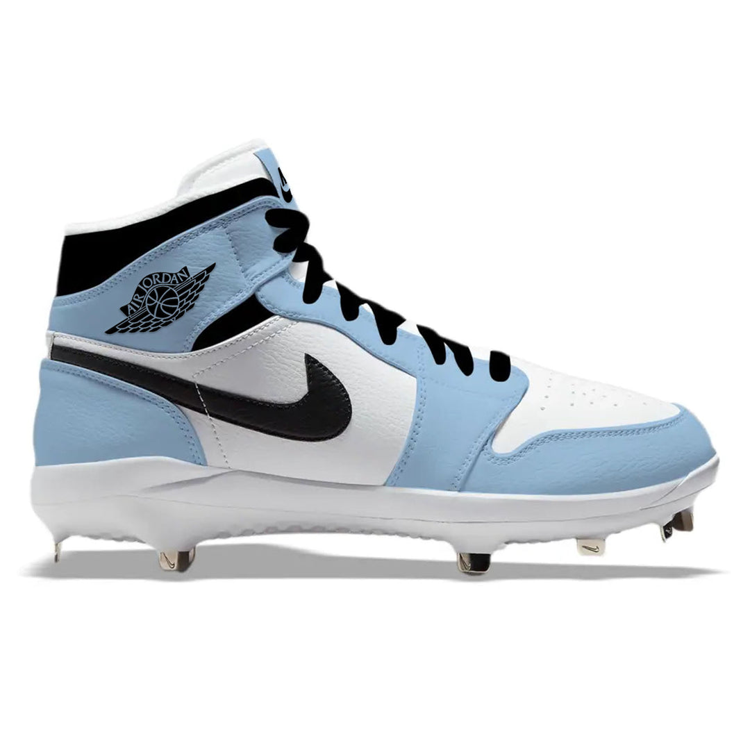 Side view of custom Jordan 1 Retro University Blue mid-top baseball cleats with metal spikes, hand-painted in Carolina blue and white.