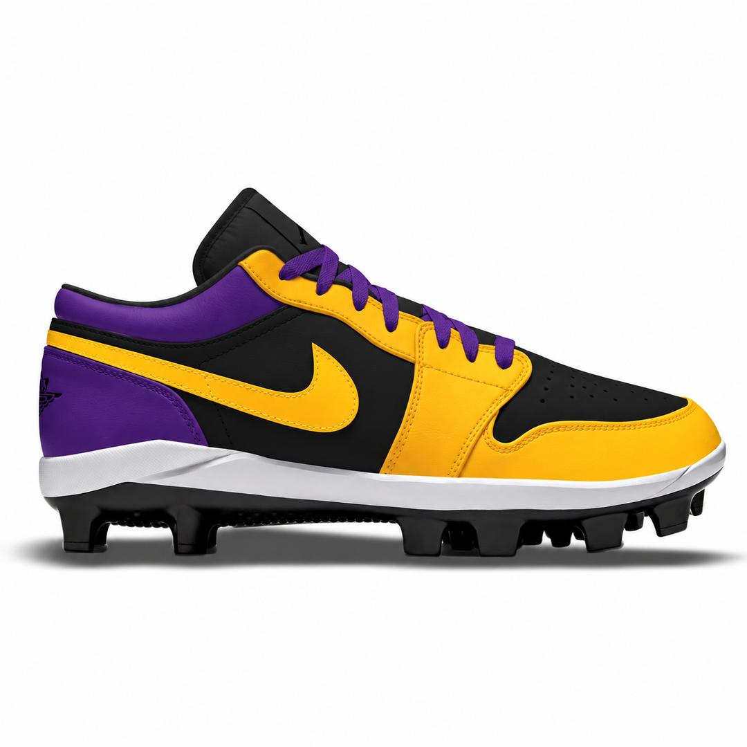 A Nike baseball cleat in black, yellow, and purple, styled after a Los Angeles Lakers sneaker, shown in a side profile on a white background.