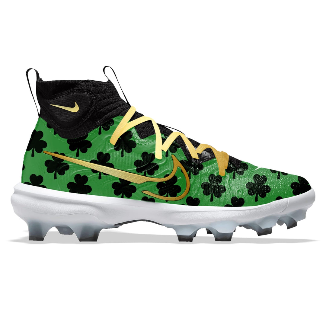 Custom green and black Nike Huarache NXT baseball cleats with shamrock clover pattern and gold Swoosh by Stadium Custom Kicks