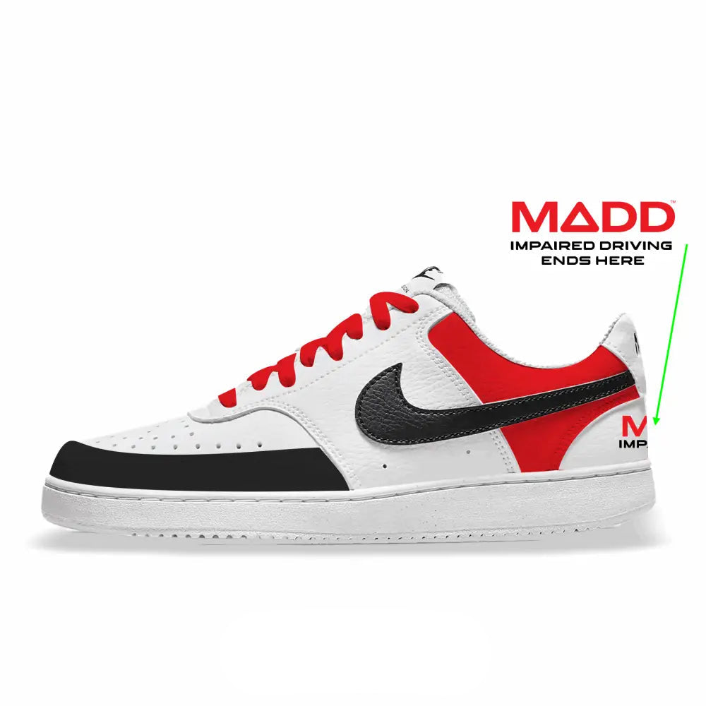 White sneaker with red and black accents on a white background, featuring MADD campaign text.