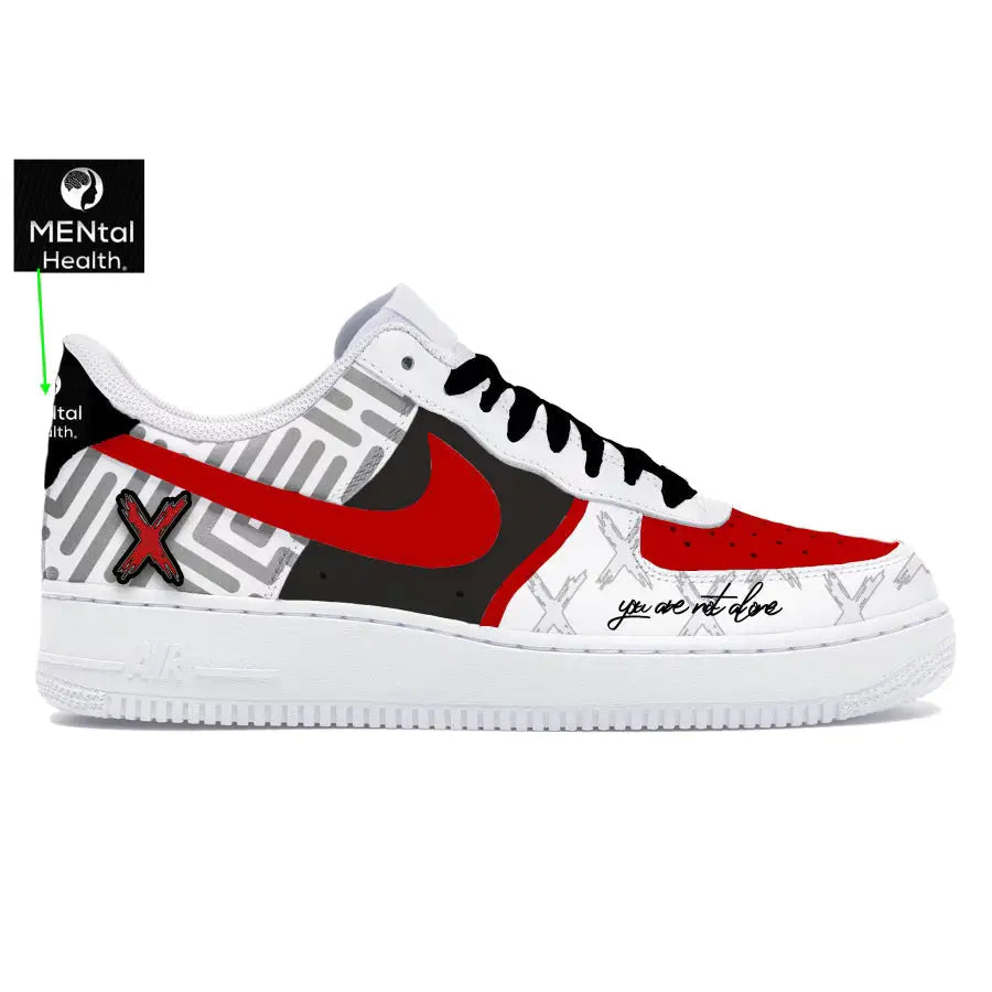 White sneaker with red and black design on a white background, featuring the Mental Health Association logo.