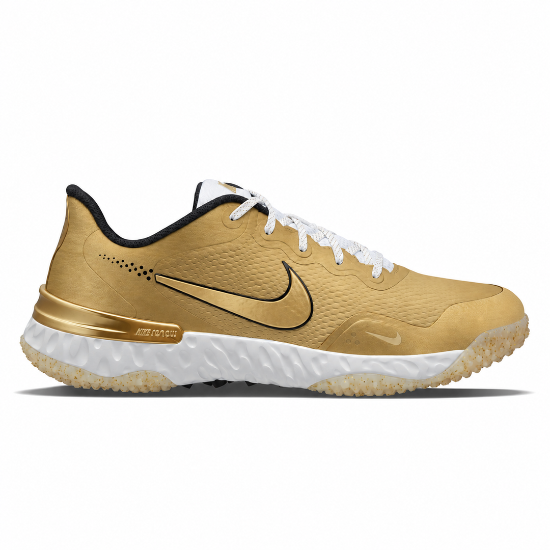 A Nike turf baseball shoe in metallic gold with a white midsole and white laces, shown from a side profile on a white background.