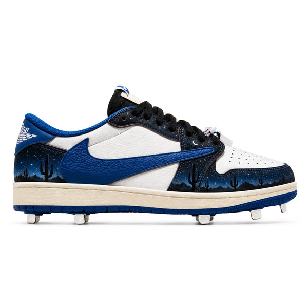 Midnight Cactus Jordan 1 Travis Scott metal baseball cleats featuring a desert night sky design with silhouetted cacti and mountains, reversed Swoosh, cream and blue Jumpman wings logo, and a cream midsole with royal blue metal spike outsole by Stadium Custom Kicks.