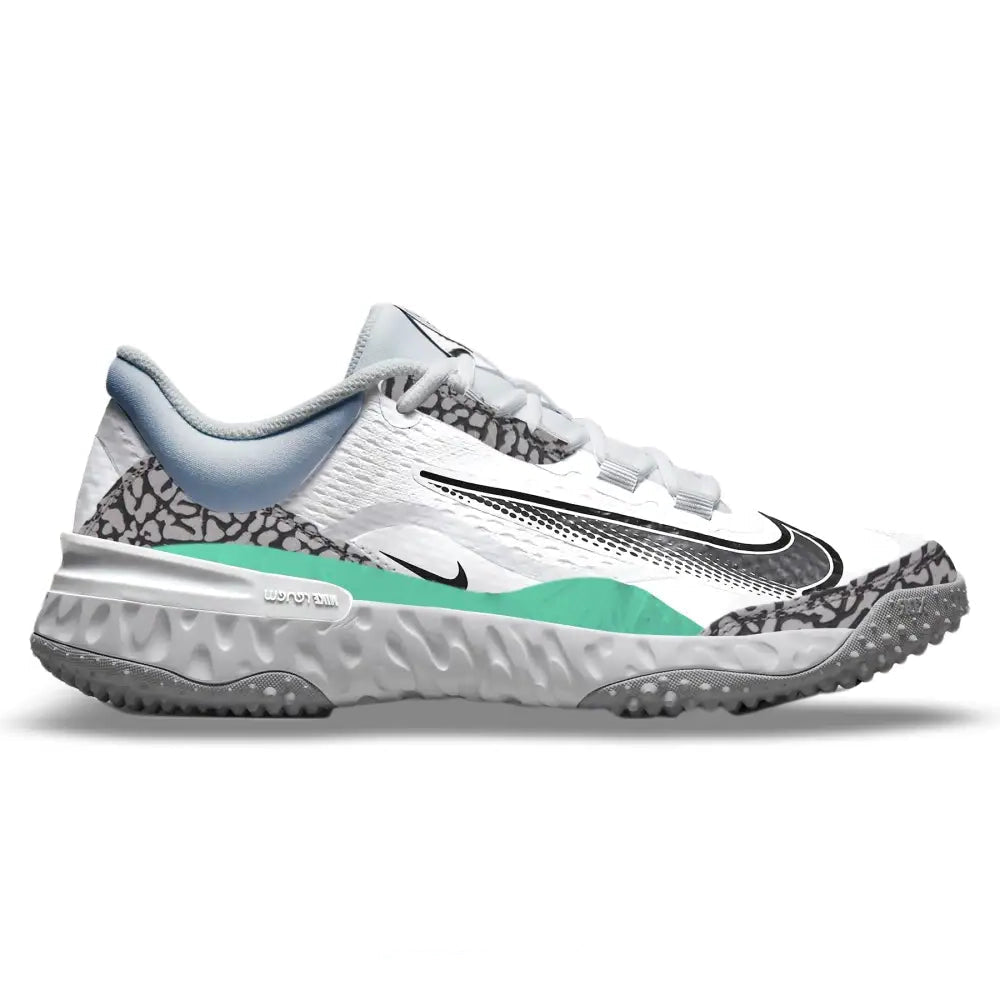 White baseball turf shoe with gray and mint green accents on a white background