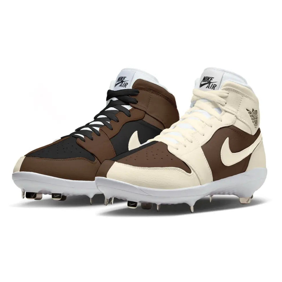 Brown and beige Nike cleats with visible brand logos on a white background
