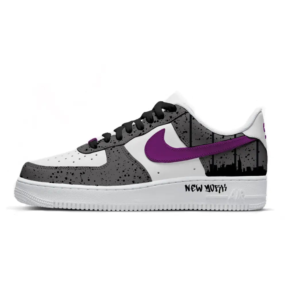 White sneaker with black and gray design and purple Nike logo on a white background