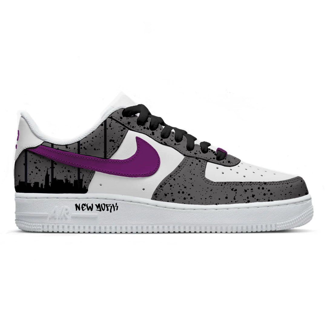 Sneaker with purple logo and black and white pattern on a white background
