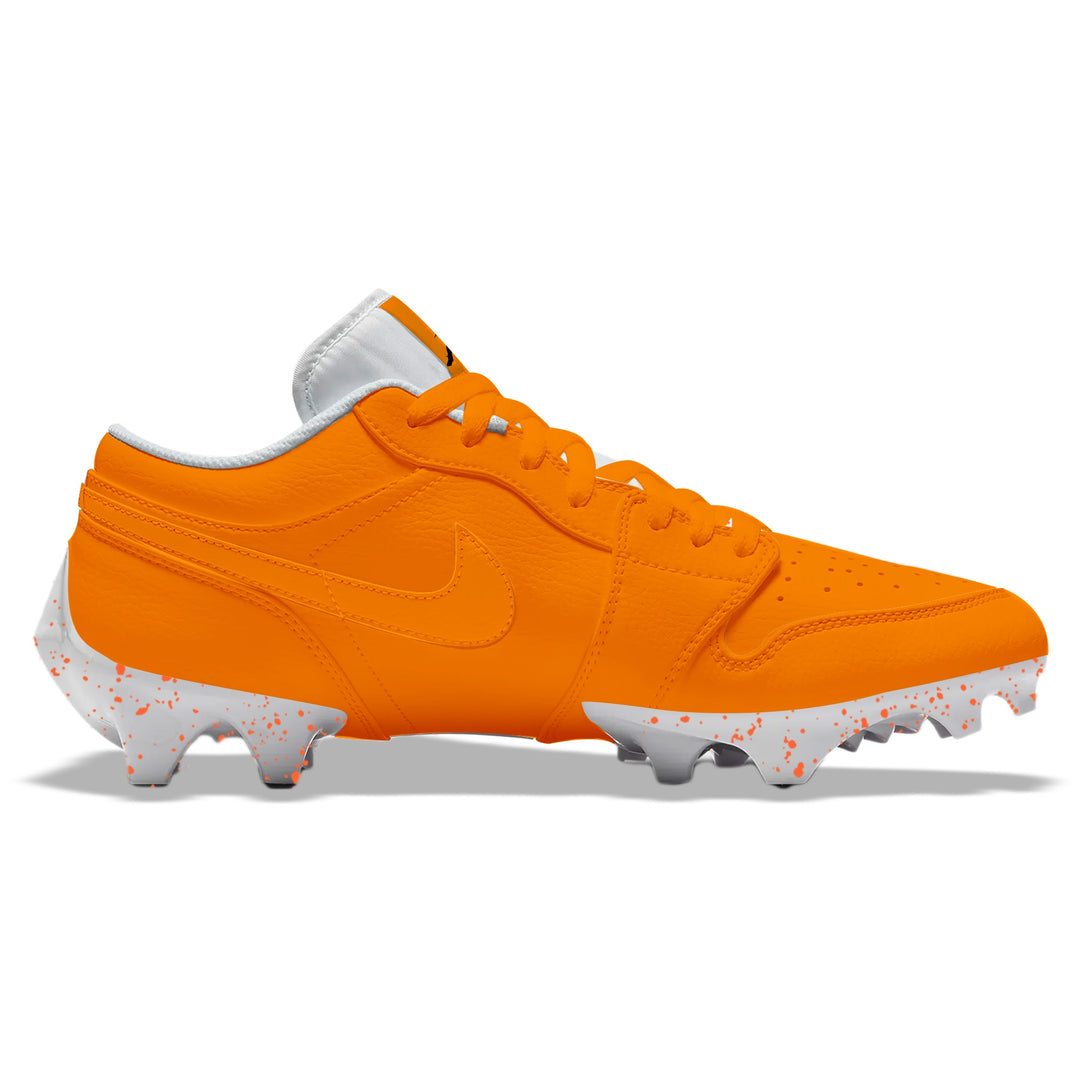 Orange Color Rush Jordan 1 Vapor Edge Low football cleats in orange with tonal Nike Swoosh and white splatter-patterned sole, side profile on a white background.